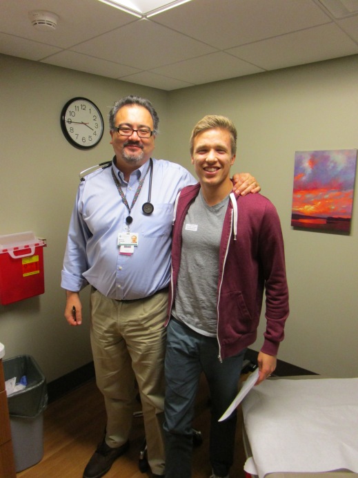 Drew and his oncologist Dr. Matt Lonergan celebrate a good checkup