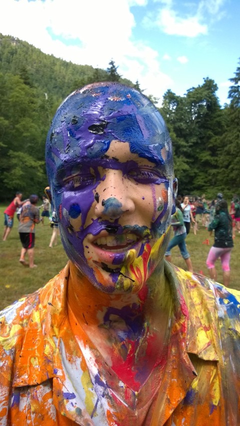 Drew pauses from a paint war while working at a kid's summer camp in British Columbia